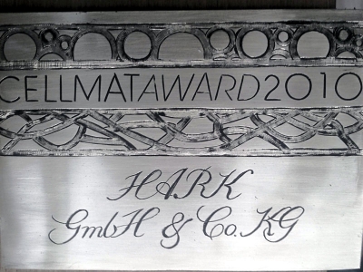 Schilder für einen Award, Handgravur auf Messing